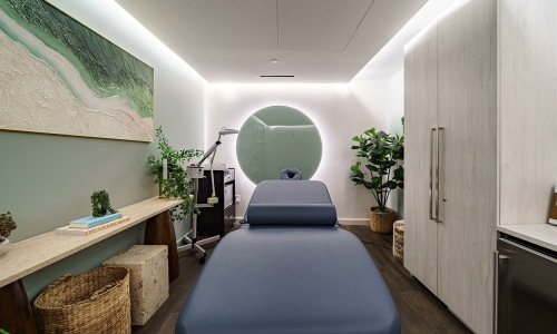 Serene Wellness Room at Gibson Point in Revere, MA Tranquil wellness treatment room at Gibson Point featuring Japanese-inspired finishes, soft lighting, and natural elements in a waterfront retreat setting